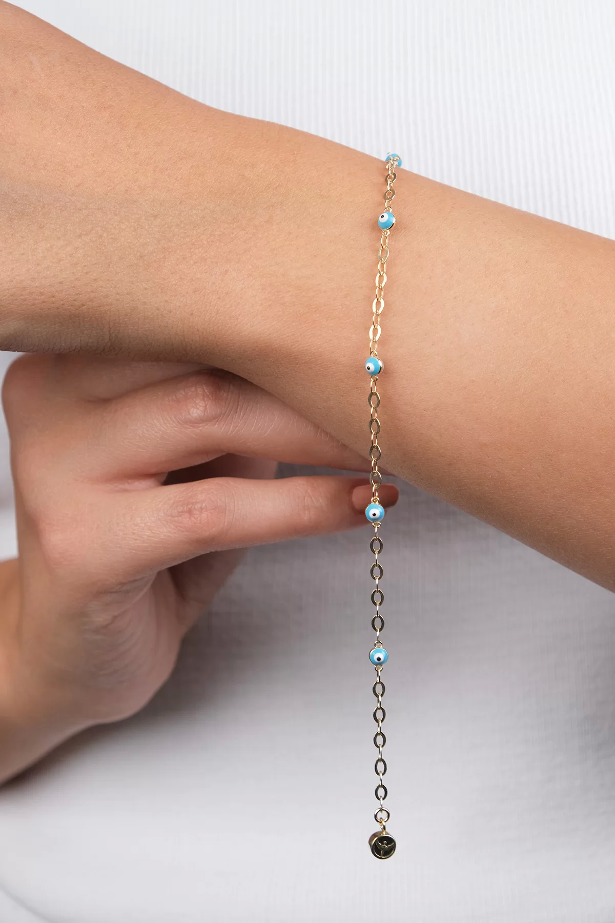 14-k-altin-cocuk-217-gram-73677.png 14 Ayar Altın Nazar Boncuklu Çocuk Bileklik 39 - Görsel 1