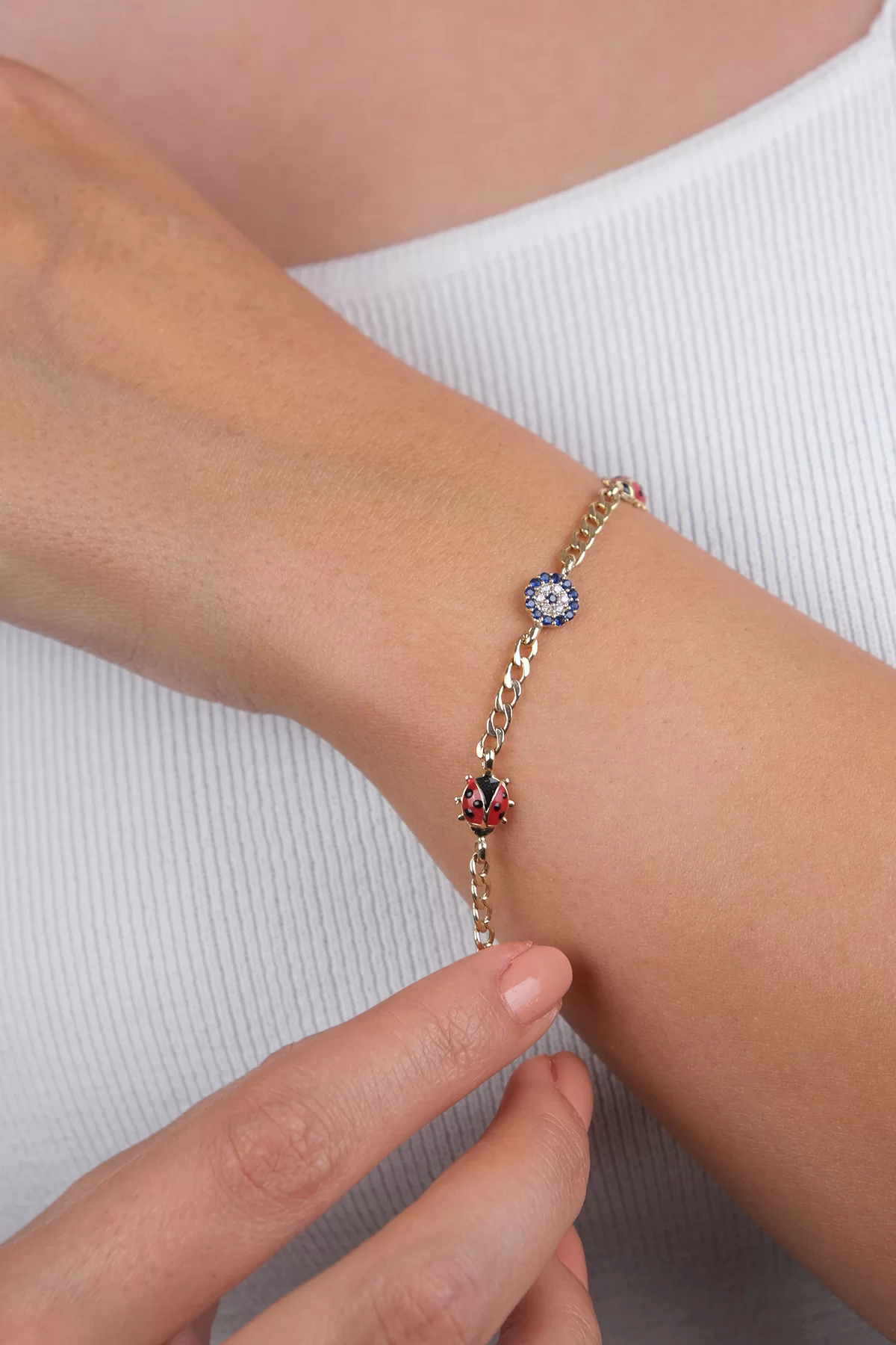 14-k-altin-cocuk-387-gram-17522.png 14 Ayar Altın Uğur Böcekli Çocuk Bileklik 38 - Görsel 1