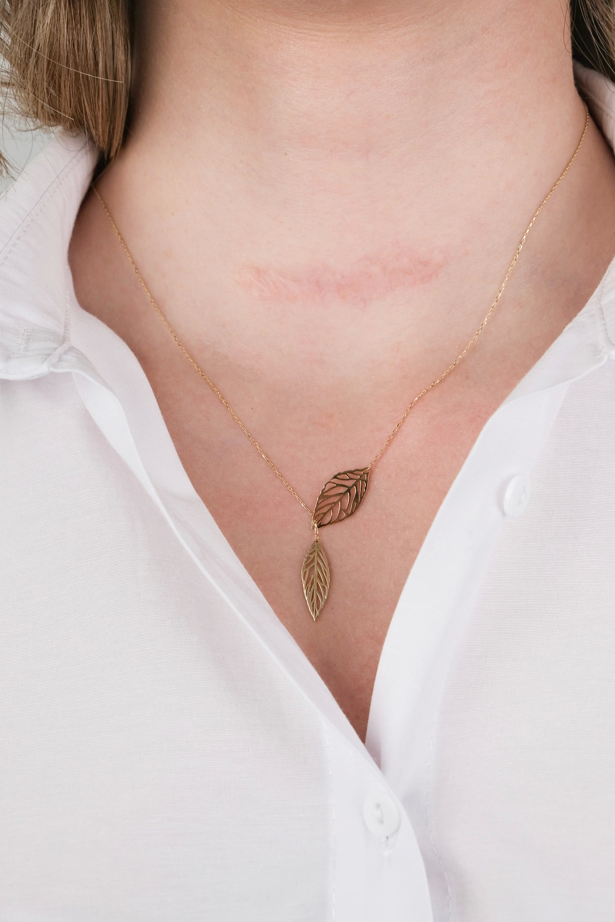 14-k-altin-kolye-236-gram-207065-sw1200sh1800.png 14 Ayar Kolye İkili Yaprak Kolye 160 - Görsel 1