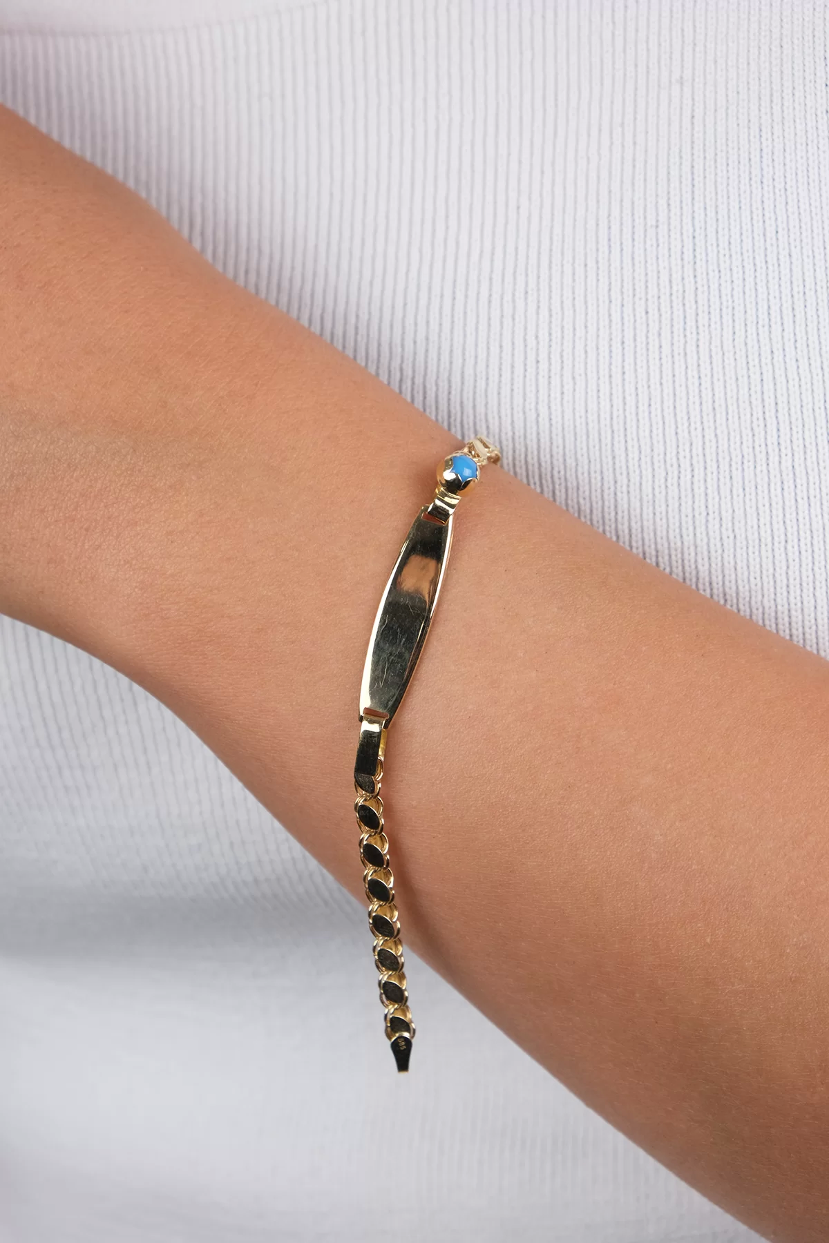 14-k-altin-cocuk-321-gram-172592.png 14 Ayar Altın Mavi Boncuklu Çocuk Künyesi 26 - Görsel 1