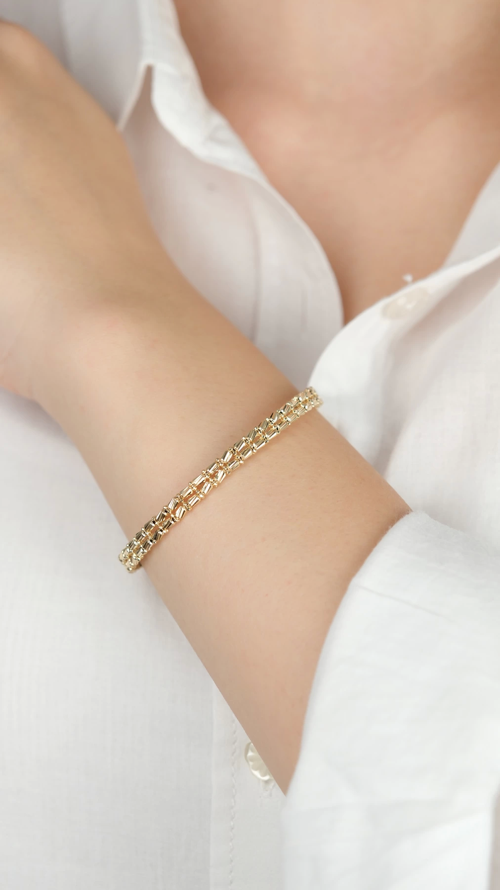 14-k-altin-kelepce-561-gram-89778878-sw1012sh1800.png 14 Ayar Altın İki Sıra Boncuklu Kelepçe 127 - Görsel 1